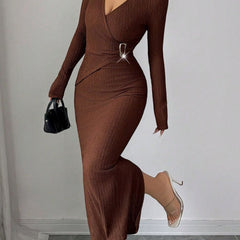 White cross-neck knit slim-fit dress by Christine Brewer, shown on a model with a stylish, modern design and soft fabric texture.