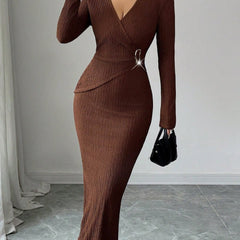 White cross neck knit slim-fit dress by Christine Brewer, shown on a model with a fitted silhouette and stylish design.