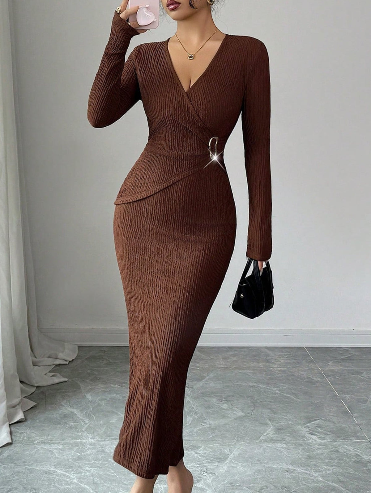 White cross neck knit slim-fit dress by Christine Brewer, shown on a model with a fitted silhouette and stylish design.