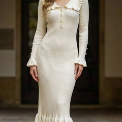 White retro ruffled knit dress by Christine Brewer, featuring a vintage-inspired design with ruffle details.