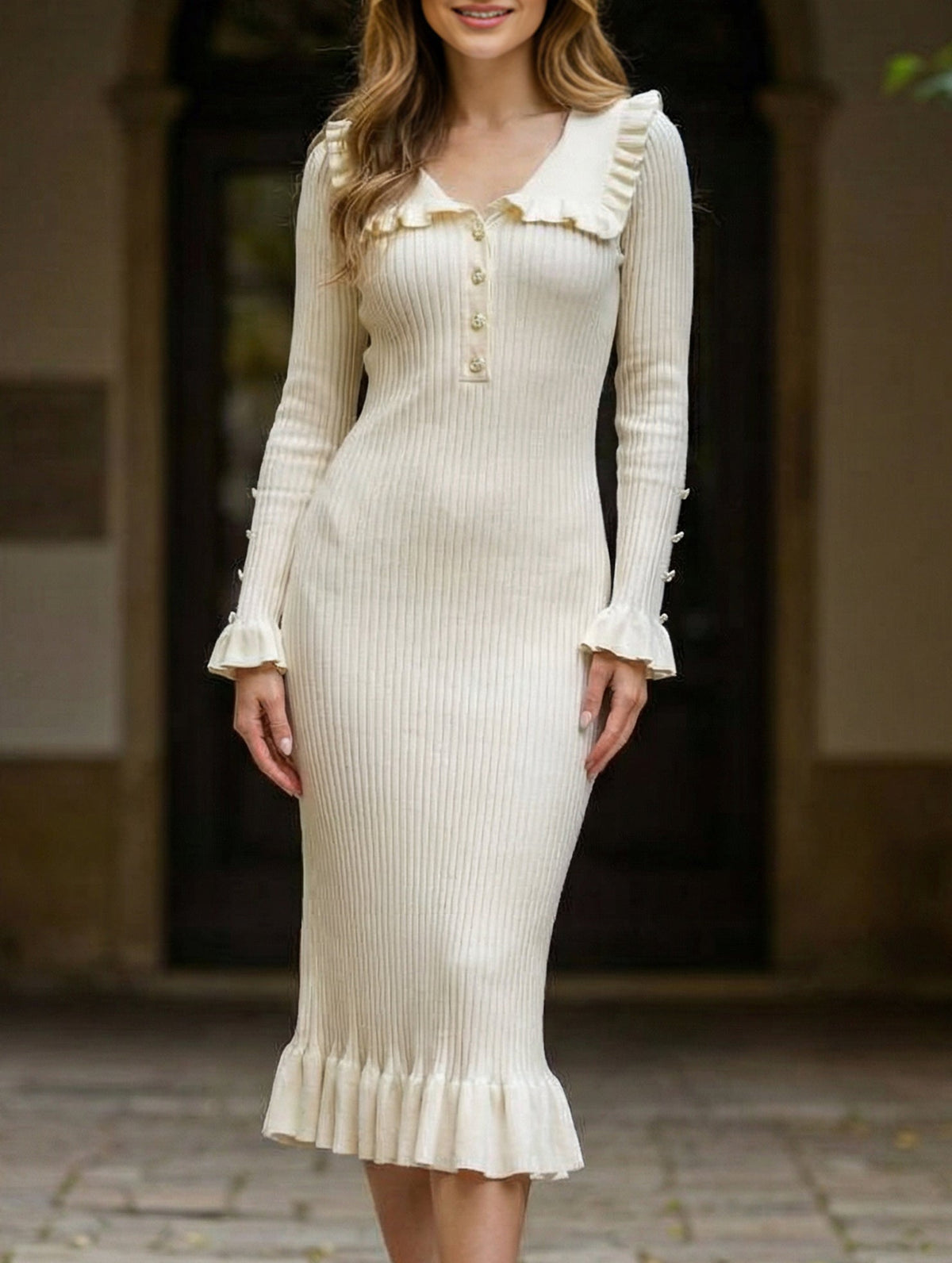 White retro ruffled knit dress by Christine Brewer, featuring a vintage-inspired design with ruffle details.