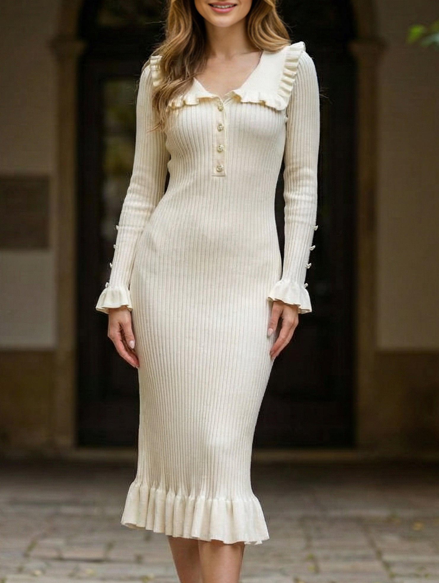 White retro ruffled knit dress by Christine Brewer, featuring a vintage-inspired design with ruffle details.
