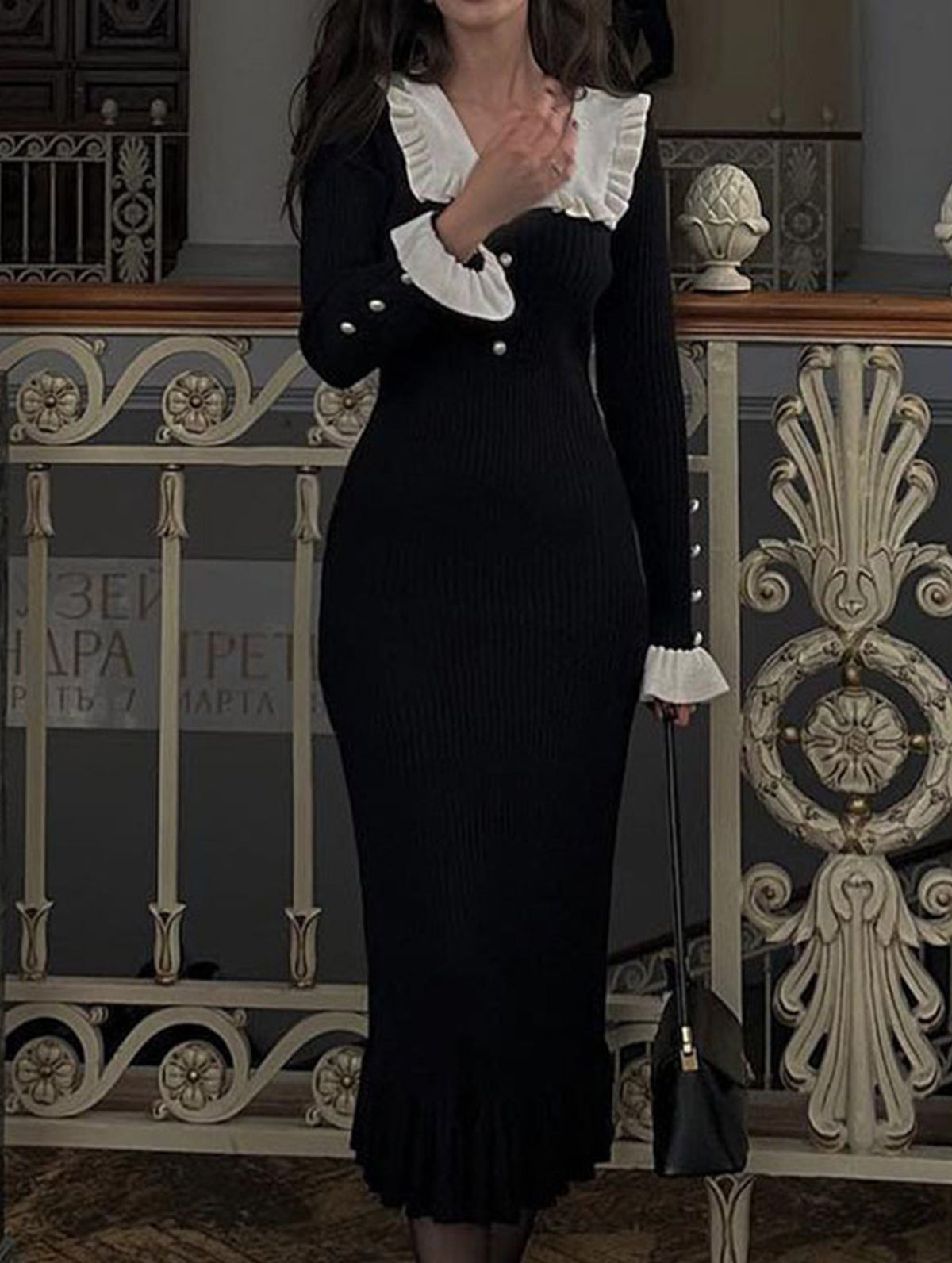 Black retro ruffled knit dress by Christine Brewer, featuring a classic silhouette and textured fabric, perfect for stylish occasions.