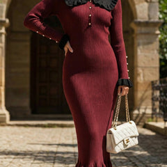 White retro ruffled knit dress by Christine Brewer, featuring a vintage-inspired design with ruffle details and a fitted silhouette.