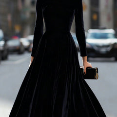 Black velvet round neck long-sleeved dress by Christine Brewer, stylish and elegant women's dress with a smooth fabric finish.