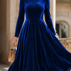White velvet round neck long-sleeved dress by Christine Brewer, stylish and elegant for casual or formal occasions.