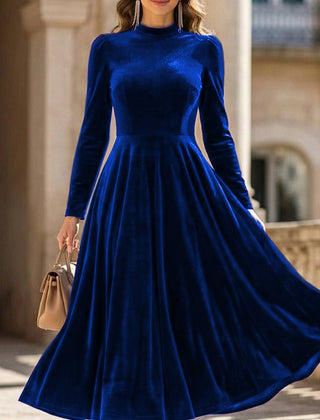White velvet round neck long-sleeved dress by Christine Brewer, stylish and elegant for casual or formal occasions.