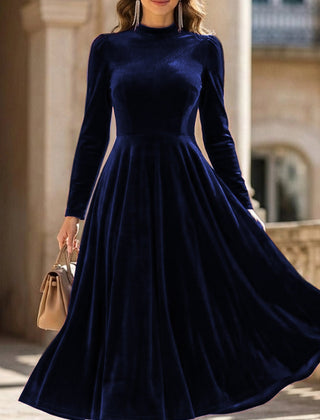 White velvet long-sleeved round neck dress by Christine Brewer, stylish and comfortable for elegant occasions.