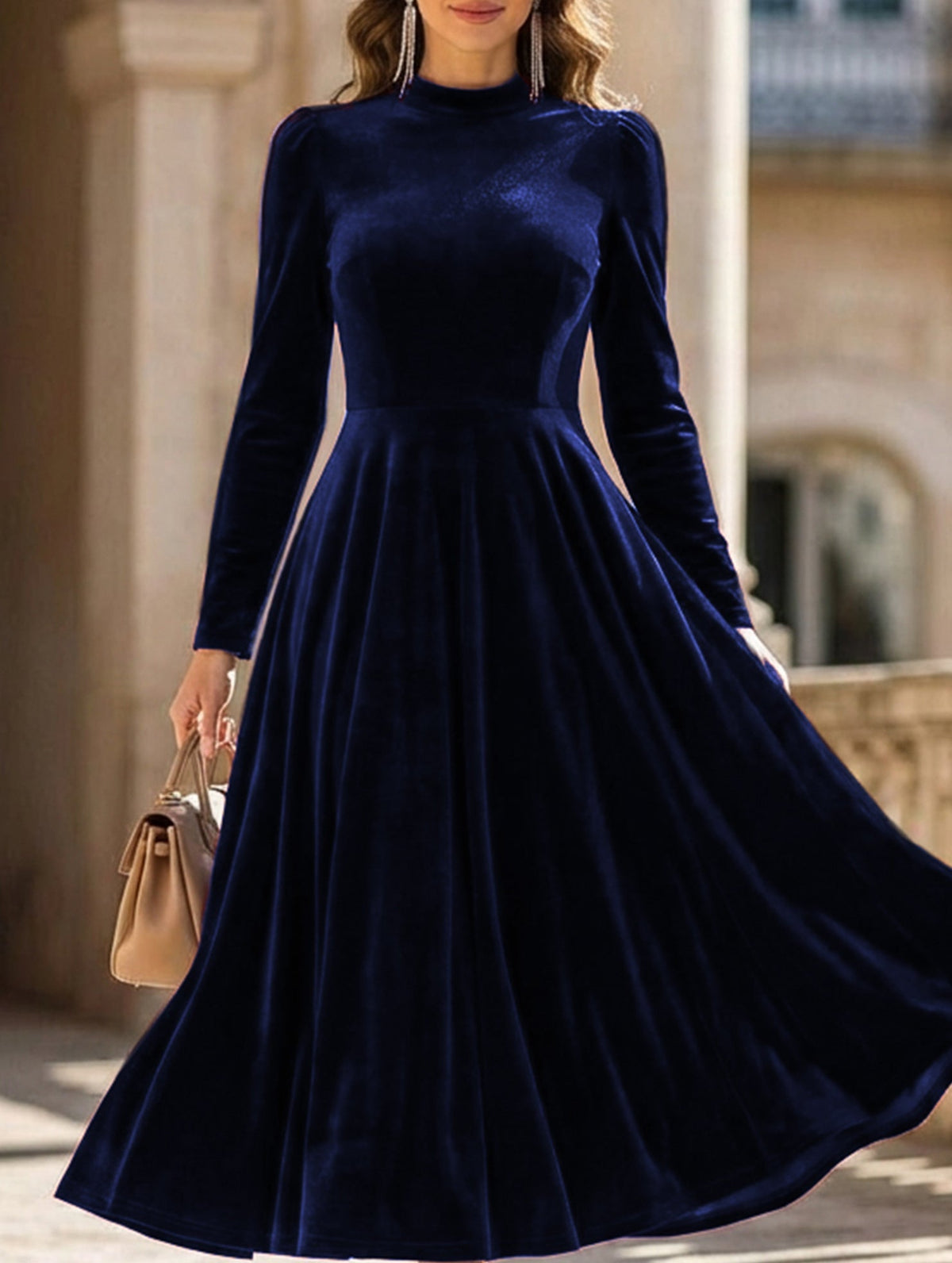 White velvet long-sleeved round neck dress by Christine Brewer, stylish and comfortable for elegant occasions.