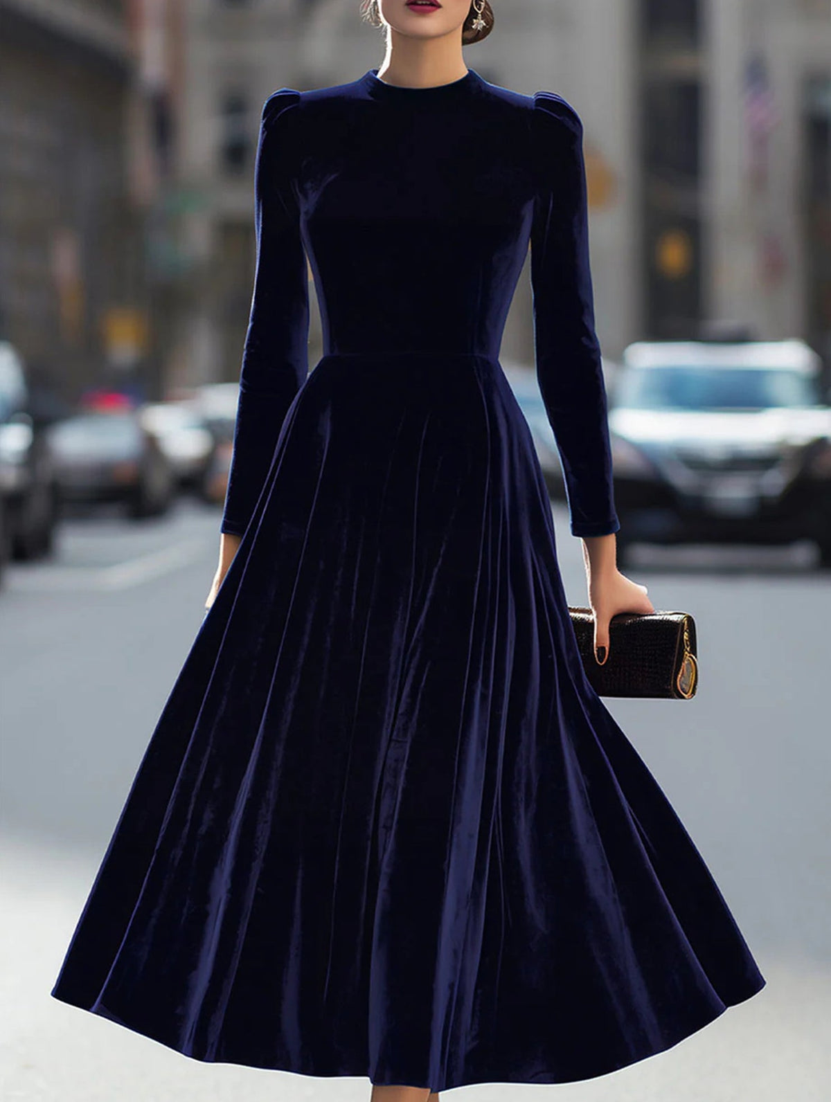 White velvet round neck long-sleeved dress by Christine Brewer, shown on a mannequin with a smooth, elegant fit.