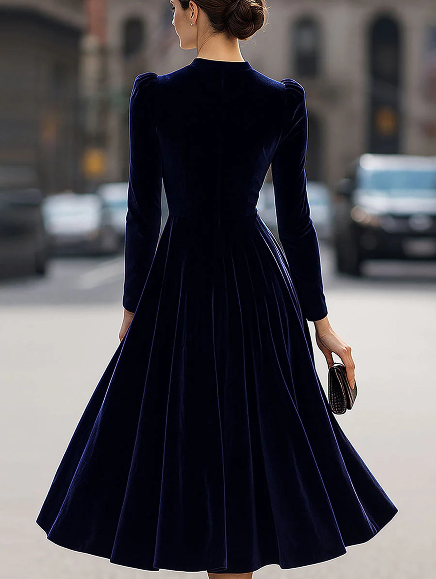 Navy velvet round neck long-sleeved dress by Christine Brewer, showcasing a fitted silhouette and soft fabric.