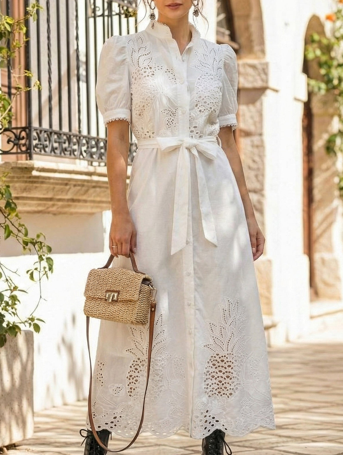 White pastoral style embroidered dress by Christine Brewer, openwork design with detailed embroidery, perfect for elegant occasions.