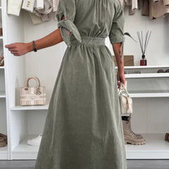 White deep V-neck fitted shirt dress by Christine Brewer, stylish dress with a tailored silhouette and button details.