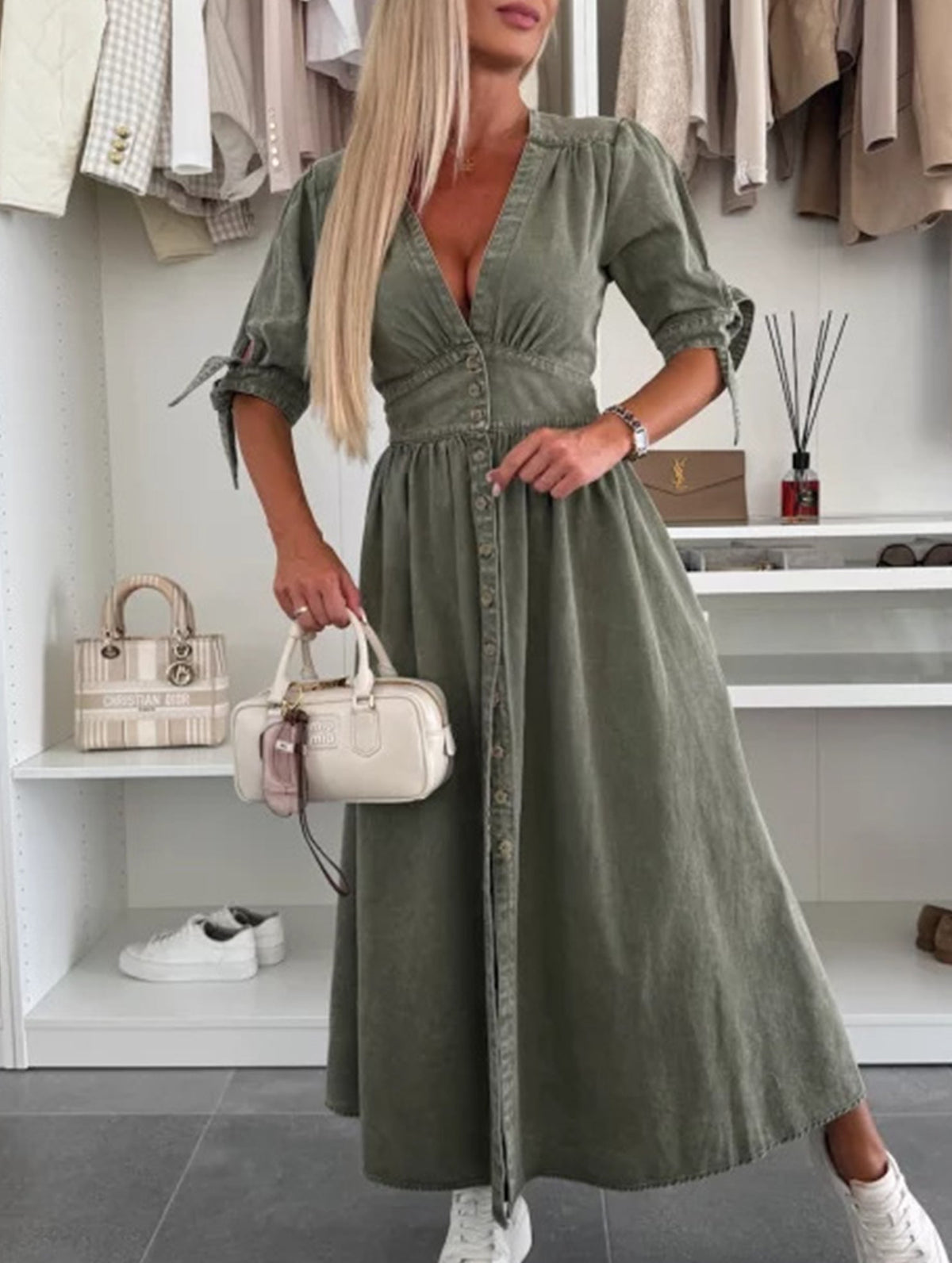 White fitted shirt dress with deep V-neck design by Christine Brewer, featuring a stylish and tailored look.