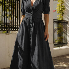 Black fitted shirt dress with deep V-neck by Christine Brewer, showcasing a sleek, stylish look perfect for casual or formal wear.