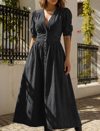 Black fitted shirt dress with deep V-neck by Christine Brewer, showcasing a sleek, stylish look perfect for casual or formal wear.