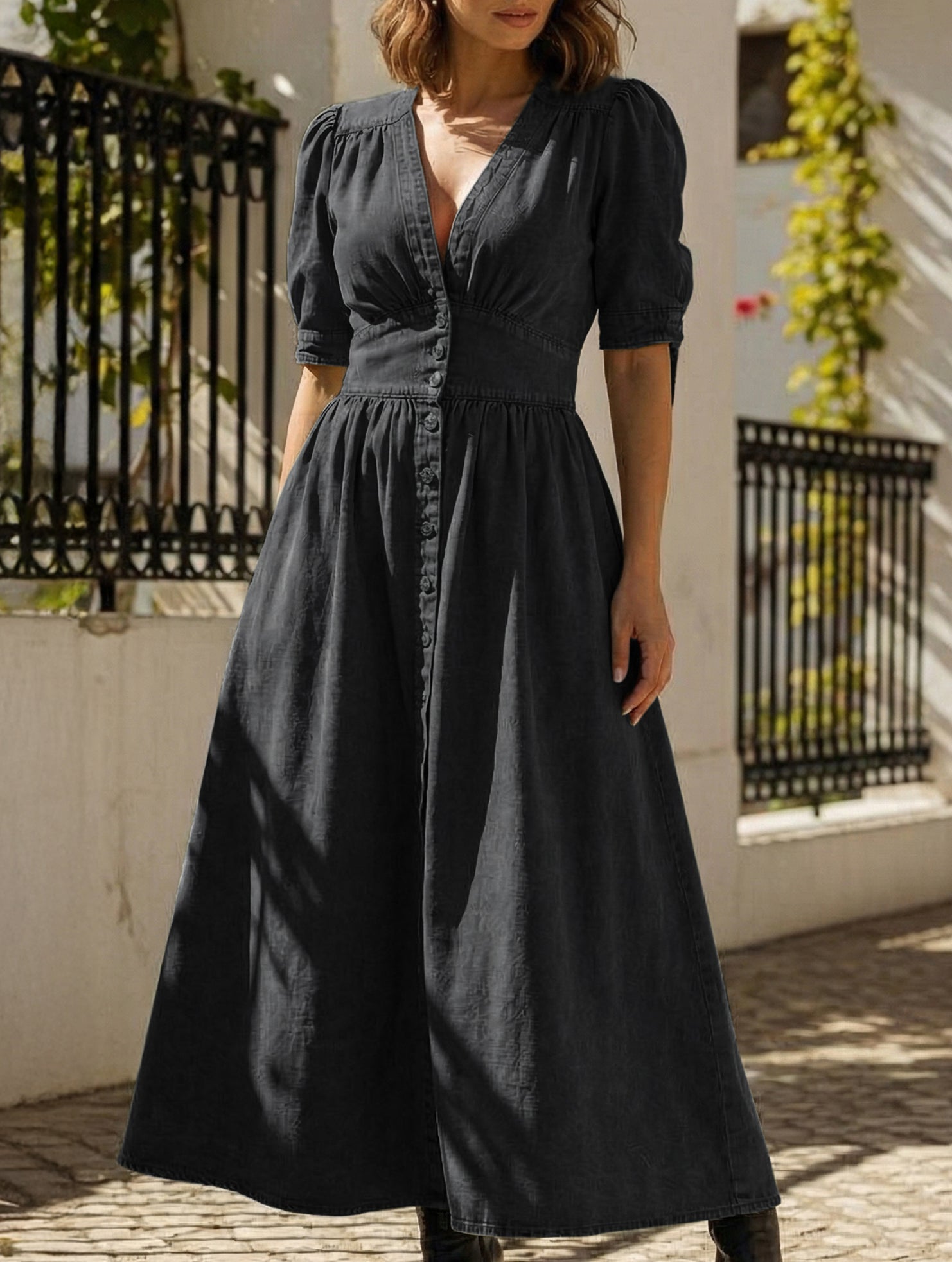 Black fitted shirt dress with deep V-neck by Christine Brewer, showcasing a sleek, stylish look perfect for casual or formal wear.