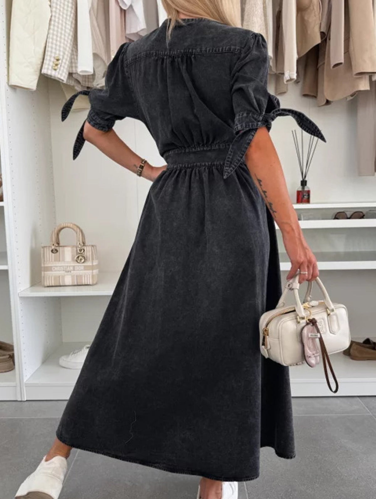 Black deep V-neck fitted shirt dress by Christine Brewer, stylish and elegant, shown on a model with long sleeves and a tailored silhouette.