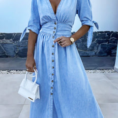 Blue fitted shirt dress with deep V-neck by Christine Brewer, styled as a chic, casual dress perfect for everyday wear.