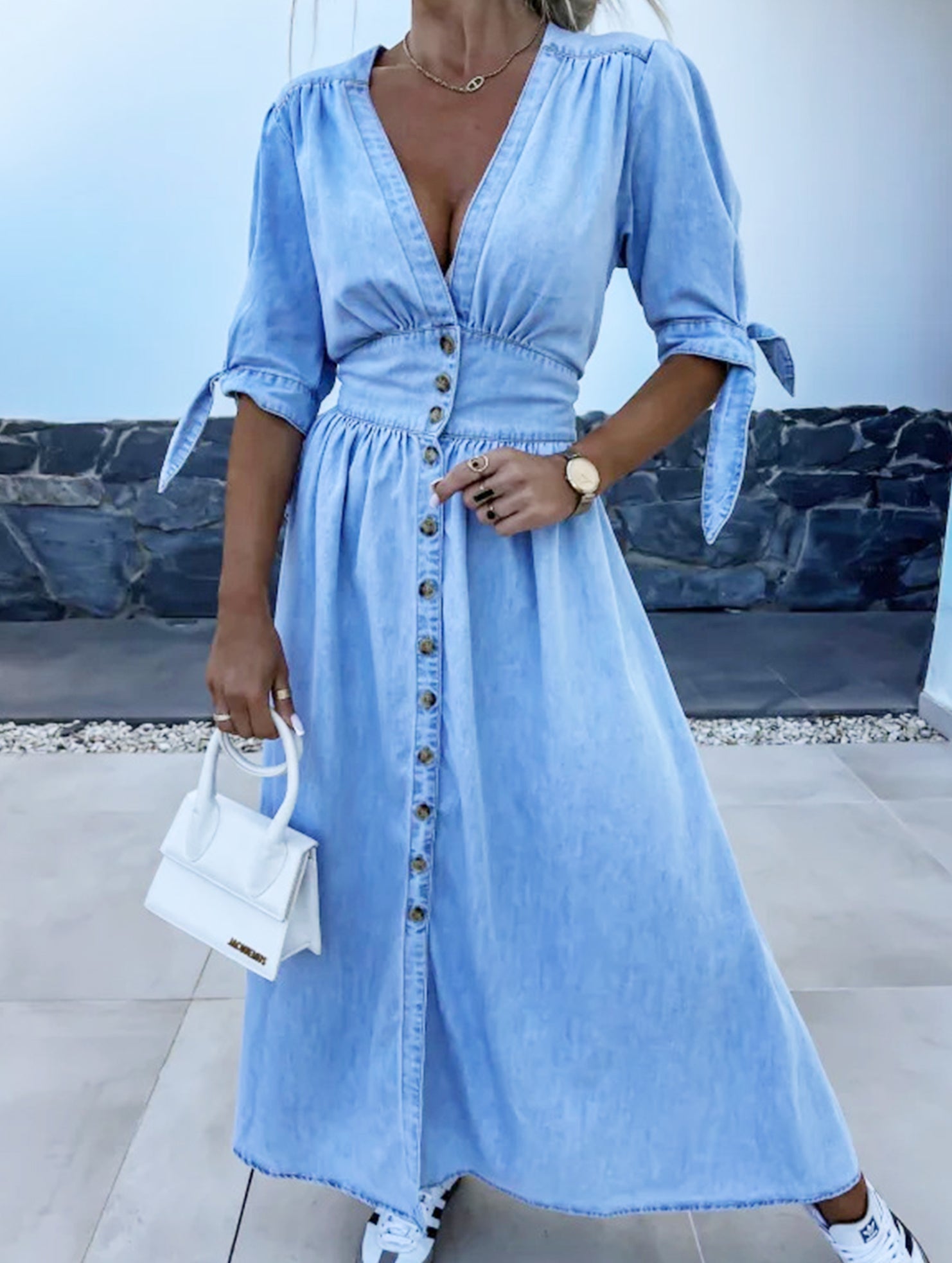 Blue fitted shirt dress with deep V-neck by Christine Brewer, styled as a chic, casual dress perfect for everyday wear.