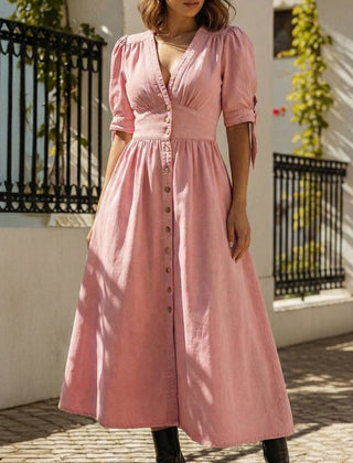 White fitted shirt dress with a deep V-neck by Christine Brewer, shown on a model. Perfect for stylish casual or semi-formal wear.