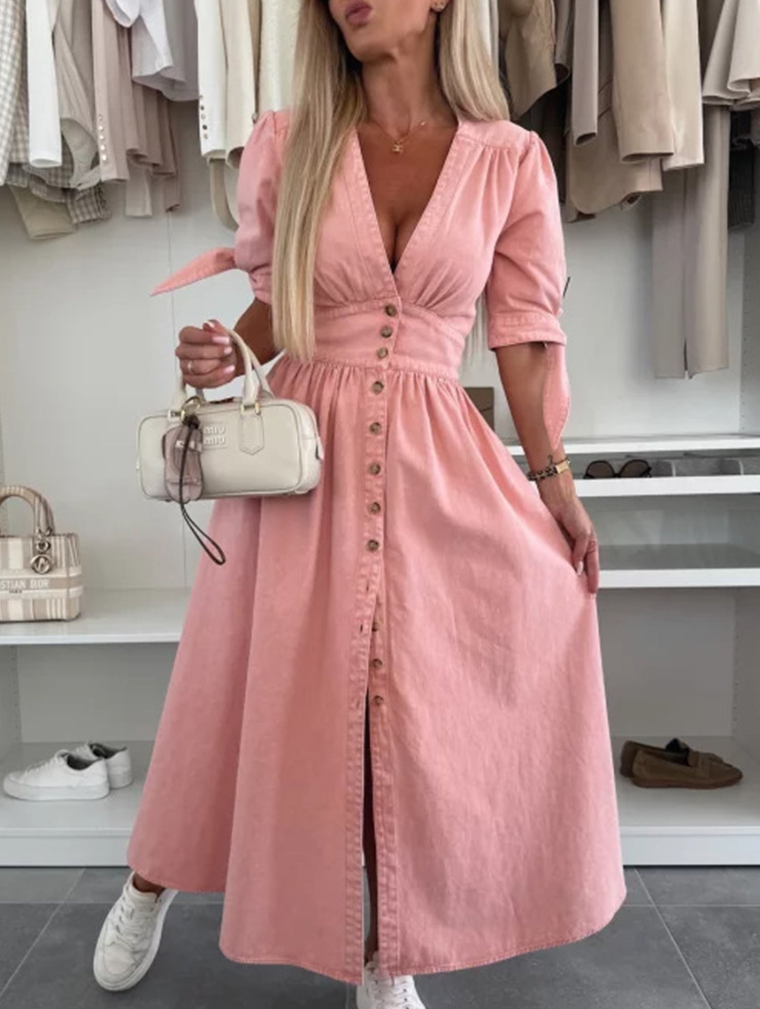 White fitted shirt dress with deep V-neck from Christine Brewer, showcasing a stylish, tailored look.