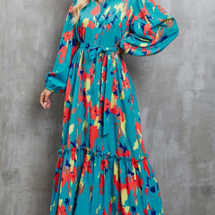 Blue printed tie-waist lantern sleeve dress by Christine Brewer, featuring a stylish silhouette and elegant design.