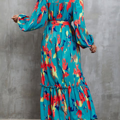 Printed tie-waist lantern sleeve dress by Christine Brewer, featuring a stylish white dress with a tie waist and lantern sleeves.