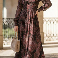 White retro long-sleeved V-neck fitted waist dress by Christine Brewer, showcasing a stylish and elegant design.