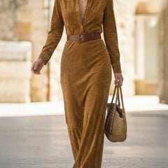White suede long dress by Christine Brewer featuring a fitted waist and belt, displayed on a hanger.