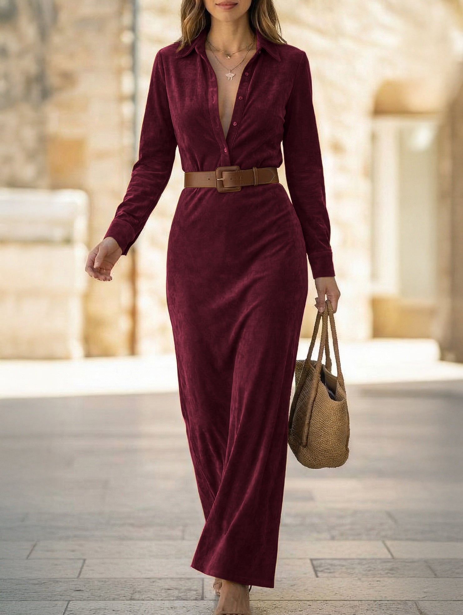 White suede long dress with a fitted waist and belt by Christine Brewer, shown on a model.