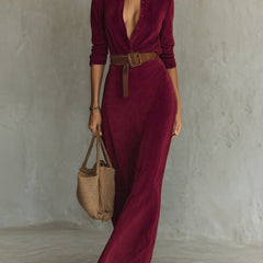 White suede long dress with fitted waist and belt by Christine Brewer, shown on a model.
