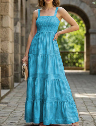 Blue and white striped retro maxi dress by Christine Brewer, featuring a flowy design and classic style.