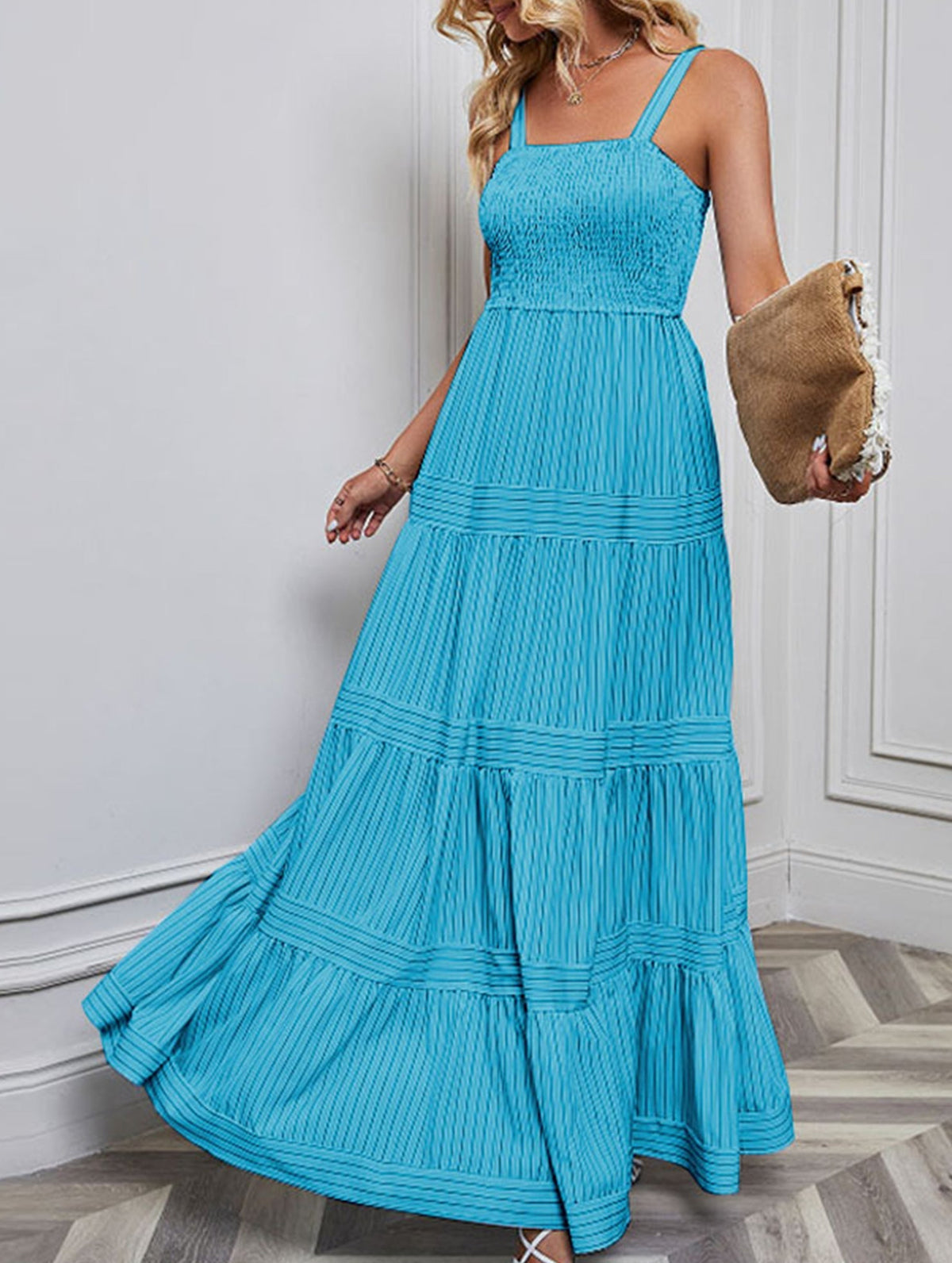 Blue retro striped maxi dress by Christine Brewer, flowing design with bold horizontal stripes, perfect for casual or summer wear.
