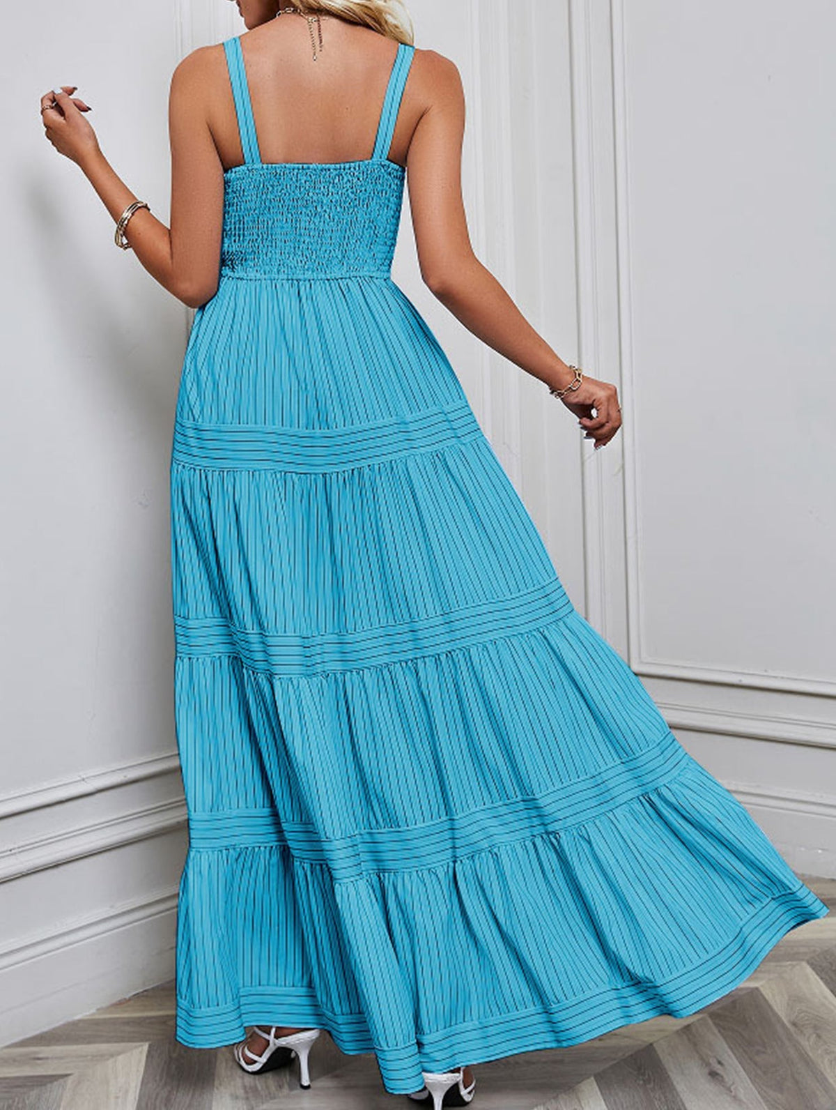 Blue and white striped retro maxi dress by Christine Brewer, flowing design with a fitted waist and sleeveless style.