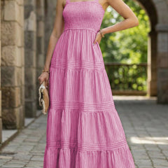 Pink striped retro maxi dress by Christine Brewer, flowing white dress with bold vertical stripes, perfect for summer wear.