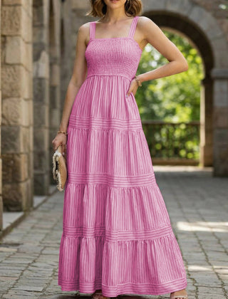Pink striped retro maxi dress by Christine Brewer, flowing white dress with bold vertical stripes, perfect for summer wear.