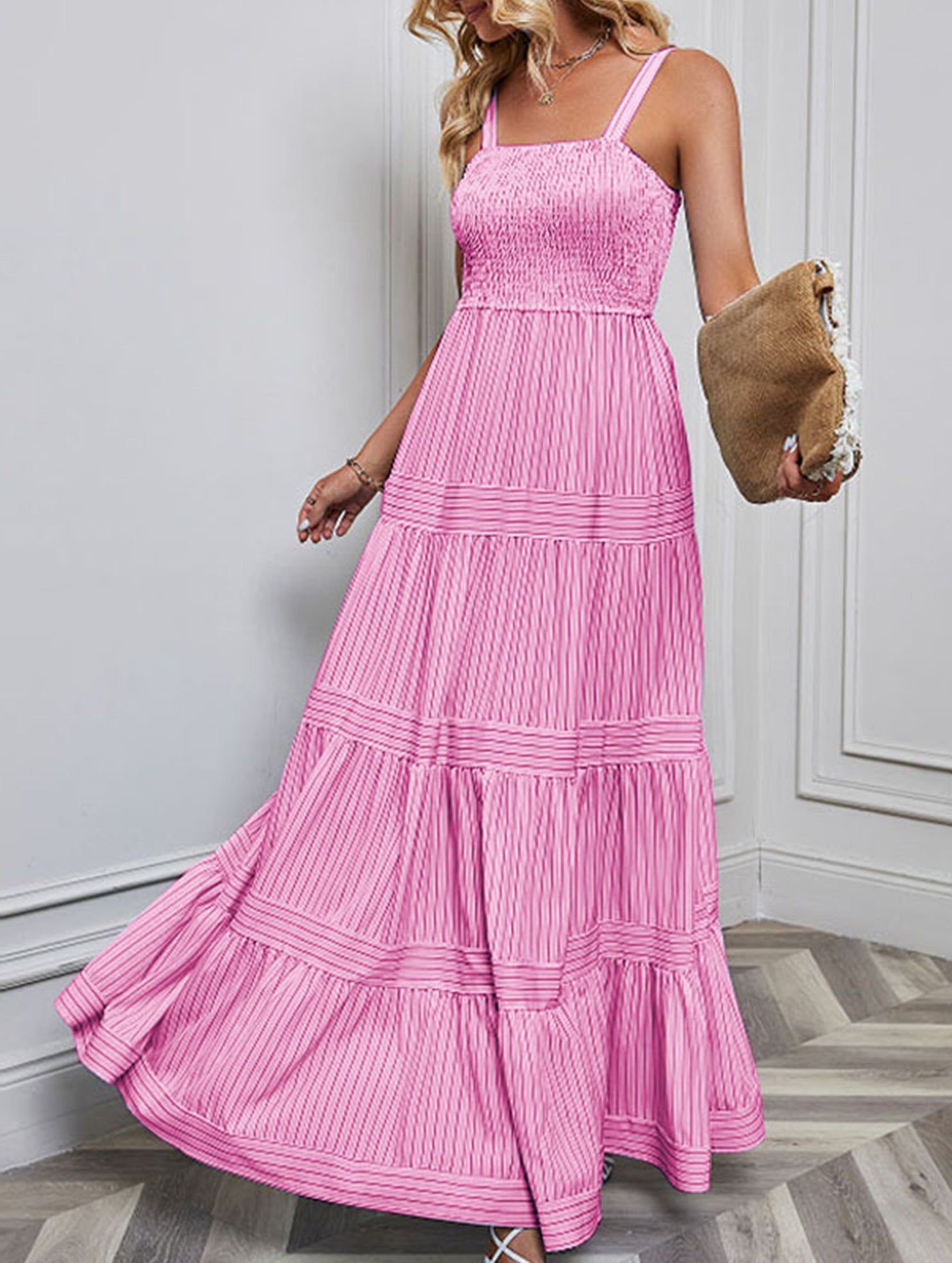 White retro striped maxi dress by Christine Brewer, flowing fabric, sleeveless design, and bold pattern perfect for summer days.