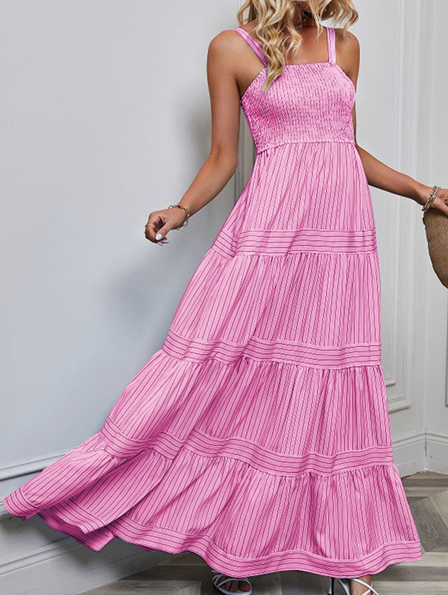 Pink retro striped maxi dress by Christine Brewer featuring a flowing silhouette and bold horizontal stripe pattern.