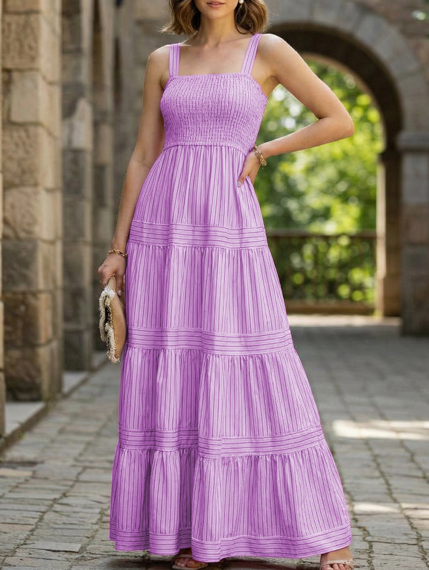 Purple retro striped maxi dress by Christine Brewer, featuring a flowy silhouette and bold vertical stripes.