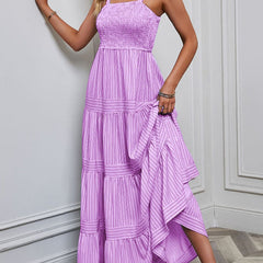 Purple retro striped maxi dress by Christine Brewer, flowing fabric with bold white and purple horizontal stripes.
