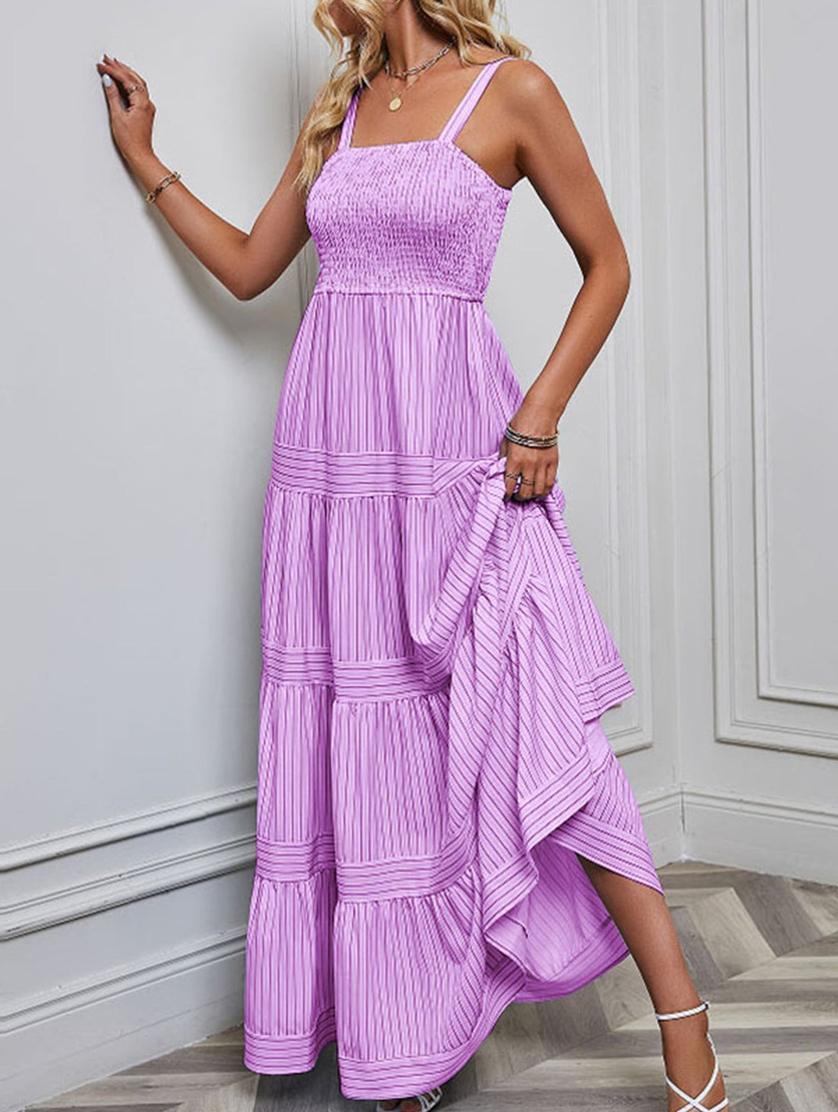 Purple retro striped maxi dress by Christine Brewer, flowing fabric with bold white and purple horizontal stripes.