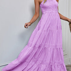 Purple retro striped maxi dress by Christine Brewer, flowing design with bold white and purple horizontal stripes.