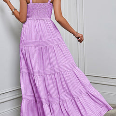 Purple retro striped maxi dress by Christine Brewer featuring a flowing silhouette and bold horizontal stripes.