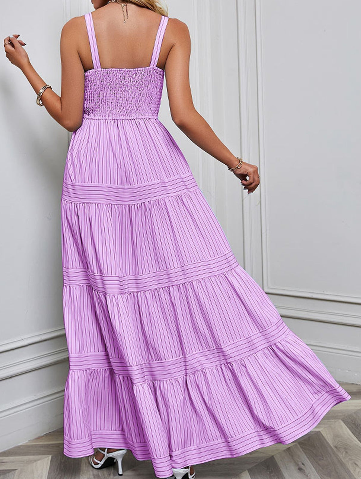 Purple retro striped maxi dress by Christine Brewer featuring a flowing silhouette and bold horizontal stripes.