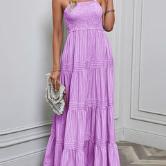 Purple retro striped maxi dress by Christine Brewer, featuring a flowing design and vibrant pattern perfect for casual or summer wear.