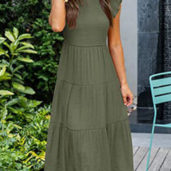 White sleeved dress by Christine Brewer featuring a solid color design, perfect for stylish cross-border occasions.