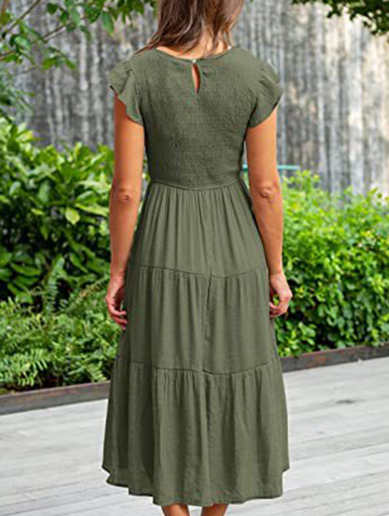 White solid color cross-border sleeved dress by Christine Brewer, styled casually on a model.