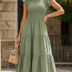 White cross-border sleeved dress by Christine Brewer, featuring a solid color design and stylish, modern silhouette.