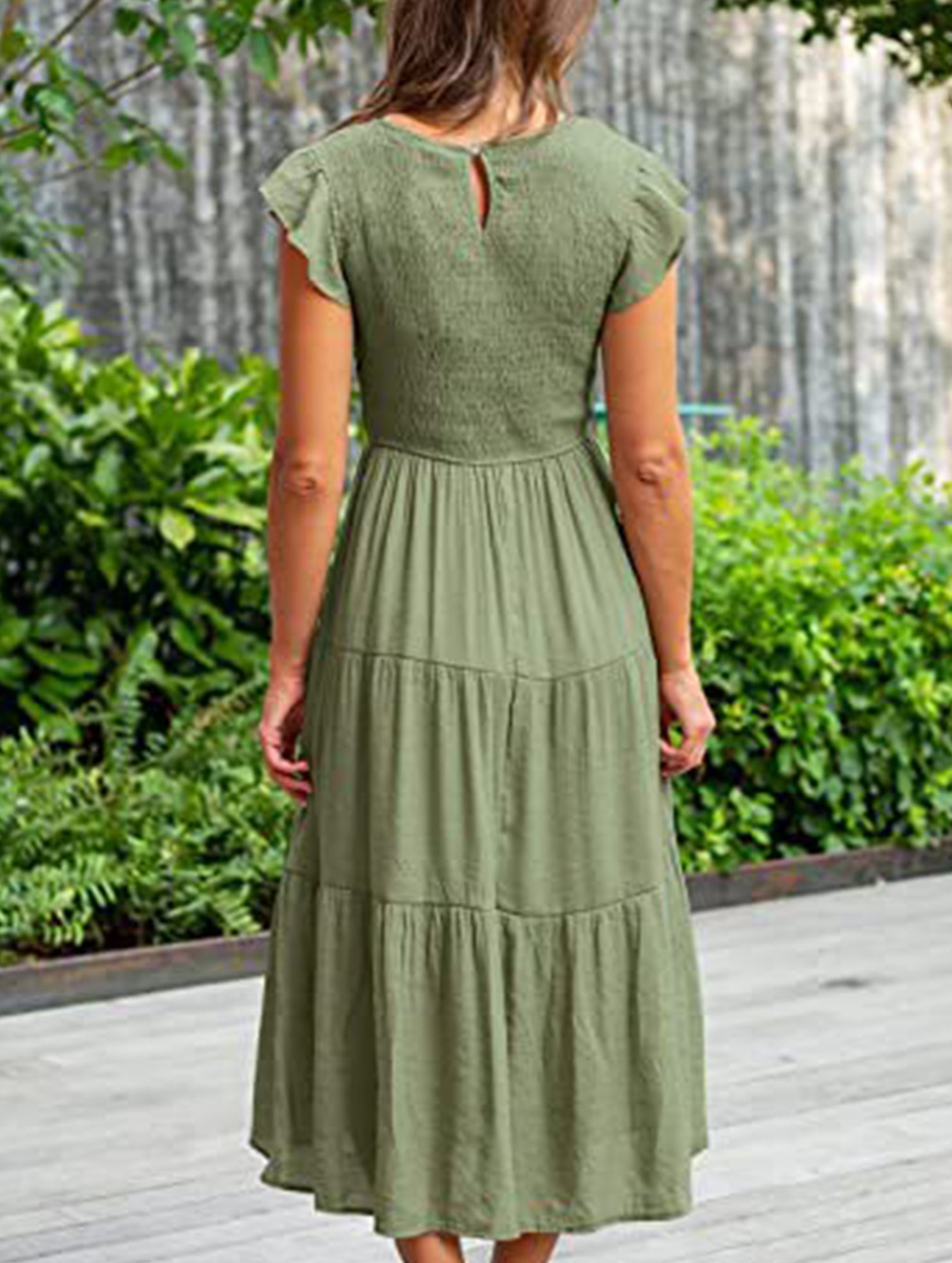 White cross-border sleeved dress by Christine Brewer, showcasing a solid color design with stylish long sleeves.